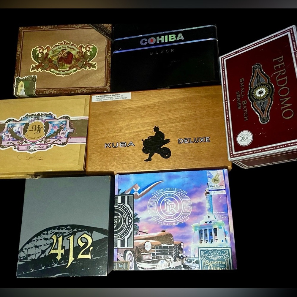 Lot of 7  Empty Wood Cigar Boxes          
Read